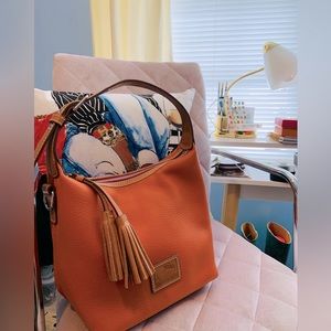 Dooney & Burke Small Tassel Leather  Hobo Purse.